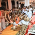 The titular Maharaja of Travancore, Sri Moolam Thirunal Rama Varma performing Pada Puja